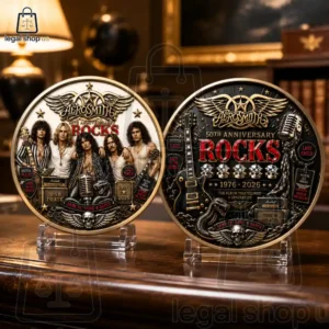 Two commemorative Aerosmith Rocks 50th anniversary collector medallions on display stands.