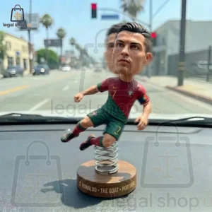 C Ronaldo 2026 World Cup Bobblehead Funko Pop Figure Cristiano Ronaldo bobblehead figure on a car dashboard