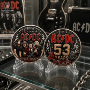 ACDC 53rd Anniversary Commemorative Challenge Coin Two commemorative AC/DC 53rd anniversary metal coins on display stands