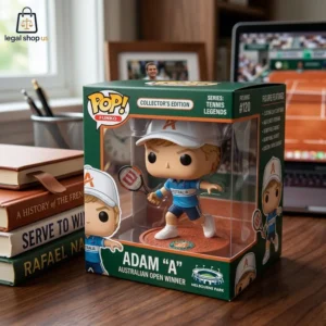 Tennis legend figurine in packaging on a desk with books