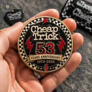 Commemorative Cheap Trick 53rd anniversary collector coin held in hand