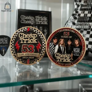 Two commemorative Cheap Trick 53rd anniversary collector coins on display stands.