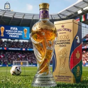 Royal Crown 2026 FIFA World Cup France Champions special edition whisky bottle on a soccer field.