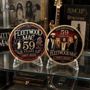 Two commemorative Fleetwood Mac 59th anniversary collectible coins on display
