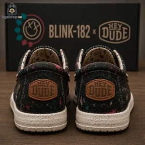 Rear view of Blink-182 x Hey Dude slip-on shoes with co-branded packaging