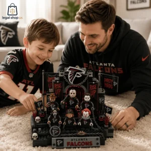 Father and son playing with an Atlanta Falcons-themed horror character brick set.