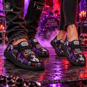 Two people wearing Alice Cooper themed Hey Dude shoes in a concert setting.