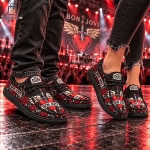 Two people wearing Hey Dude Bon Jovi themed slip-on shoes at a concert