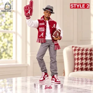 University of Alabama Ken doll wearing Crimson Tide gear holding a foam finger and football.