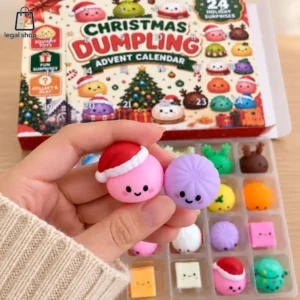 2026 Christmas Dumpling Advent Calendar Person holding two small dumpling toys in front of a Christmas holiday advent calendar